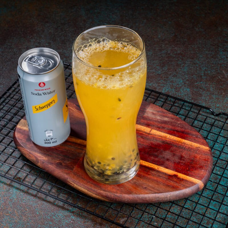 Passion Fruit Lemonade in Schweppes with Fruit Pulp