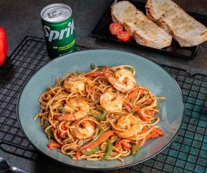 Spicy Cajun Shrimp Pasta served with garlic bread and drink (Choice of Pasta Penne, Farfalle, Fettuccini, Fussili, Spaghetti)